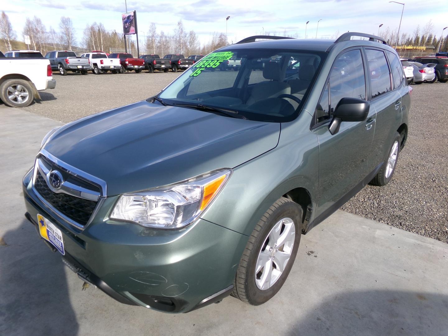 2015 Green Subaru Forester 2.5i Premium (JF2SJABC5FH) with an 2.5L H4 SOHC 16V engine, 6-Speed Automatic transmission, located at 2630 Philips Field Rd., Fairbanks, AK, 99709, (907) 458-0593, 64.848068, -147.780609 - Photo#0